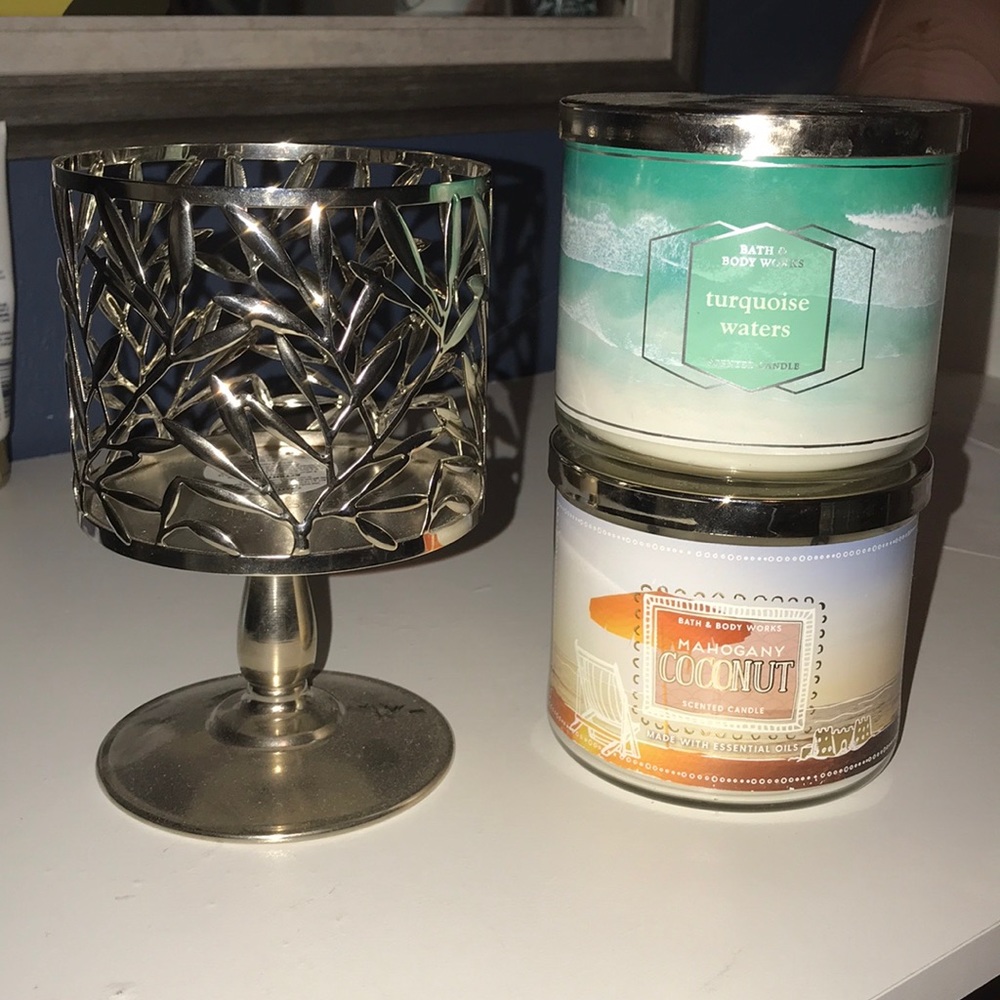 A bath and body works candle holder and 2 candles!